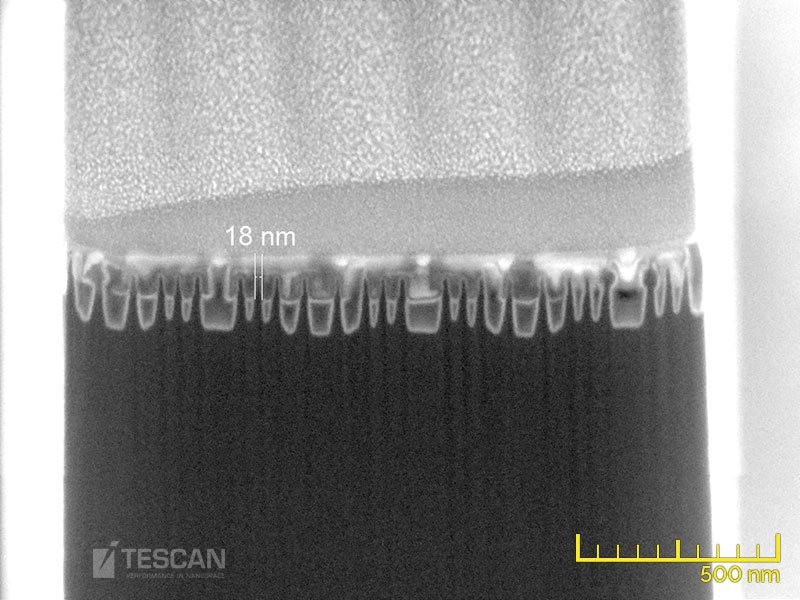 A 14 nm technology node Intel processor. A side-view (“Fin-cut”) of a lamella during thinning, the final lamella was prepared just in the middle of a single fin (thickness less than 20 nm)